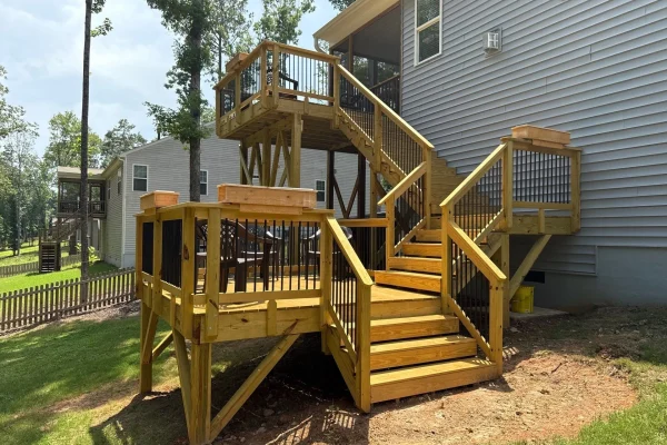 multi-level-pressure-treated-wood-deck-black-balusters